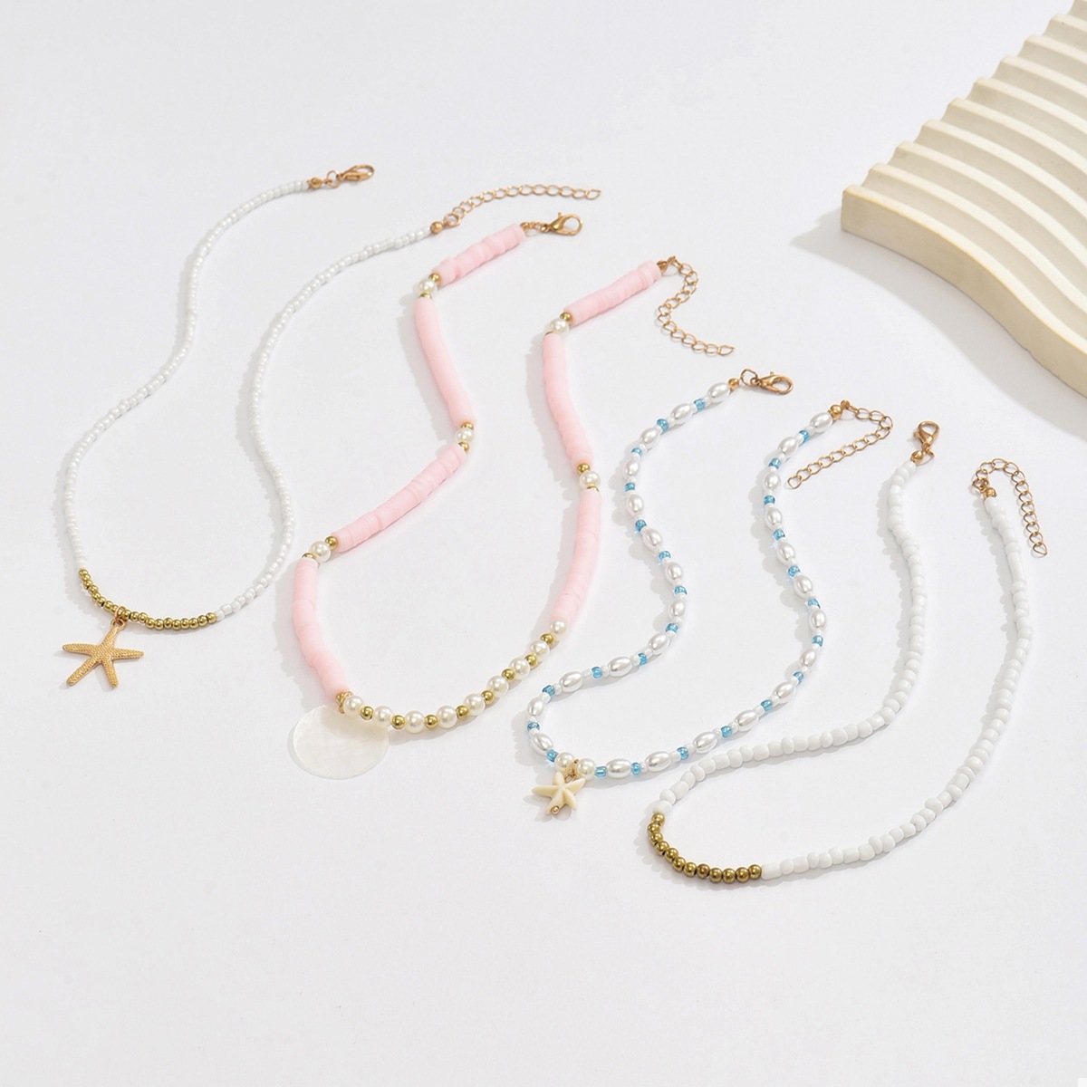 4 Piece Beaded Starfish Charm Necklace