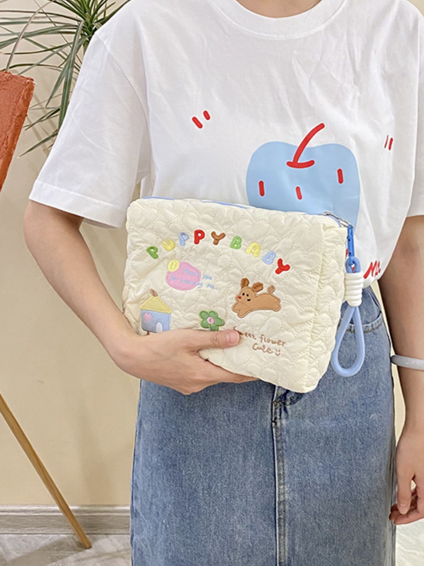 Cartoon Embroidered Quilted Clutch