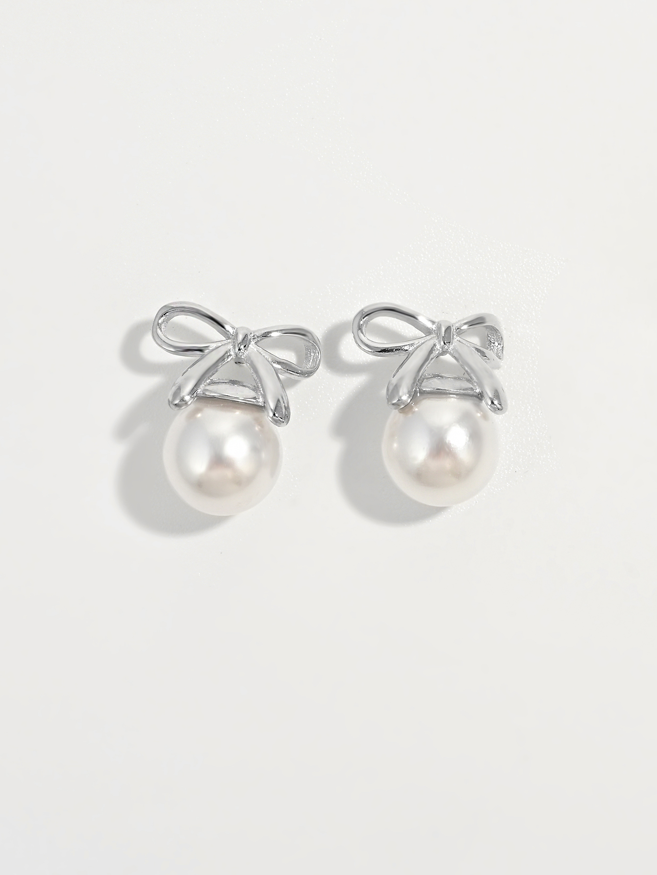 925 Sterling Silver Pearl Bow Earrings