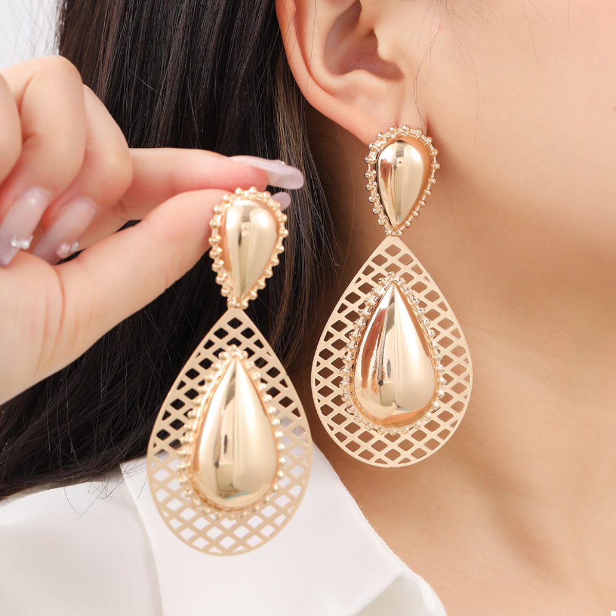 Hollowed-Out Teardrop Statement Earrings