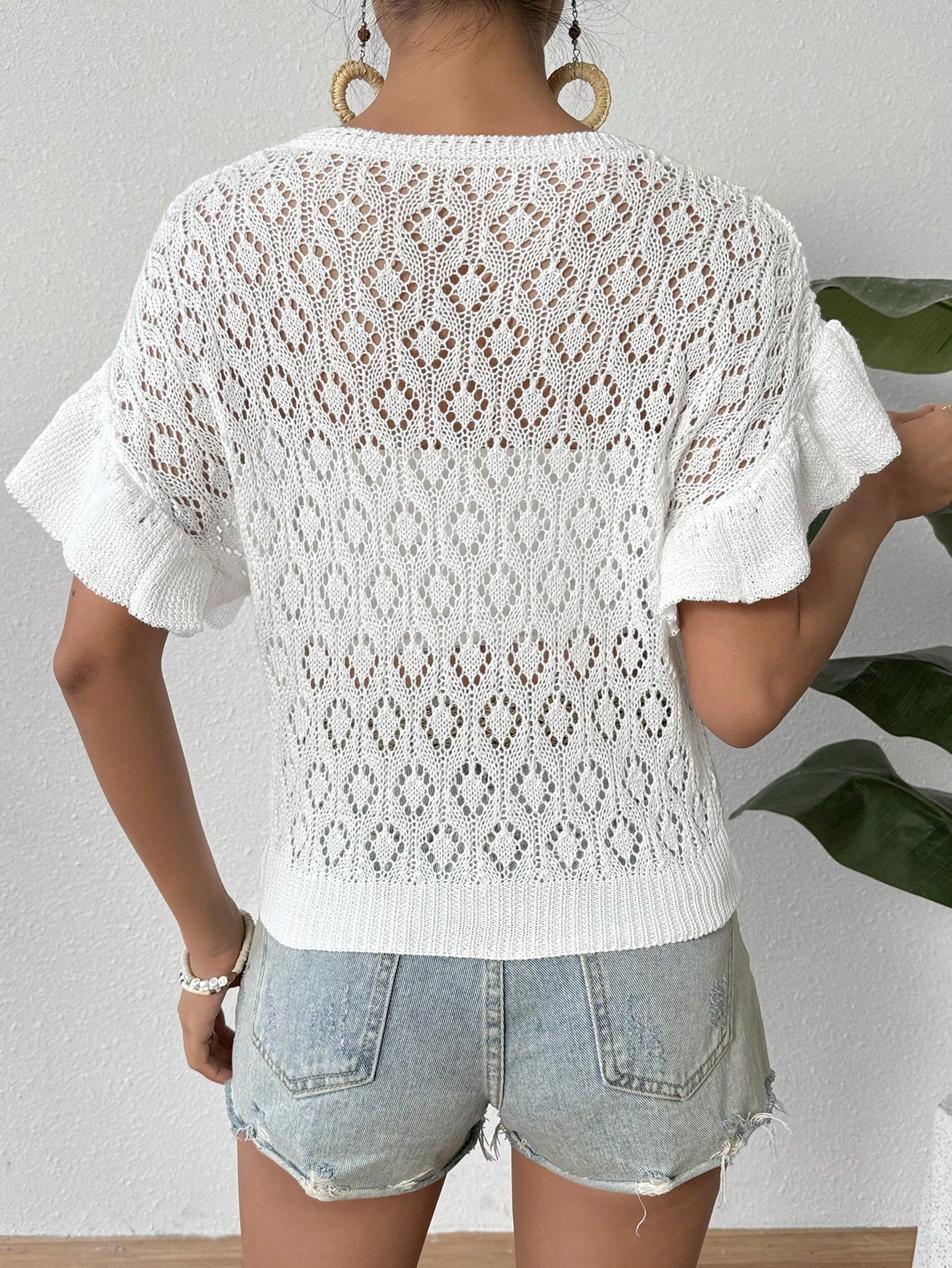 Ruffled Openwork Round Neck Knit Top