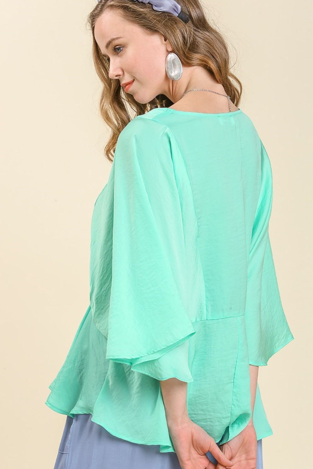 Umgee Full Size Satin Pleated Peplum Round Neck Blouse Plus Size