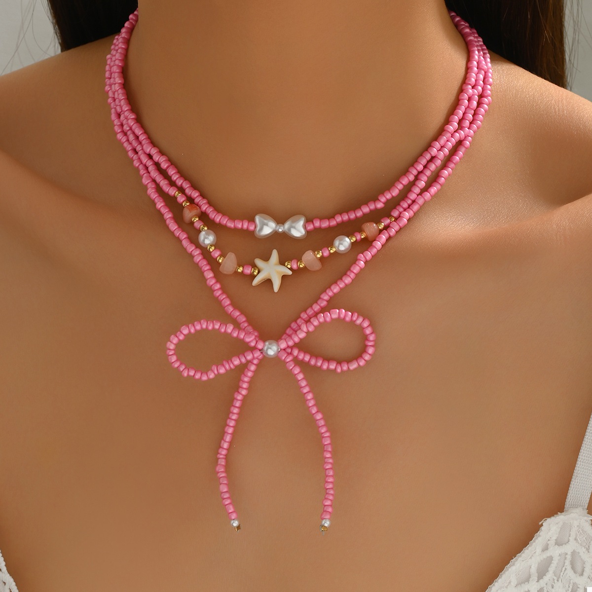 Beaded Three-Layered Necklace with Bow and Starfish Charms