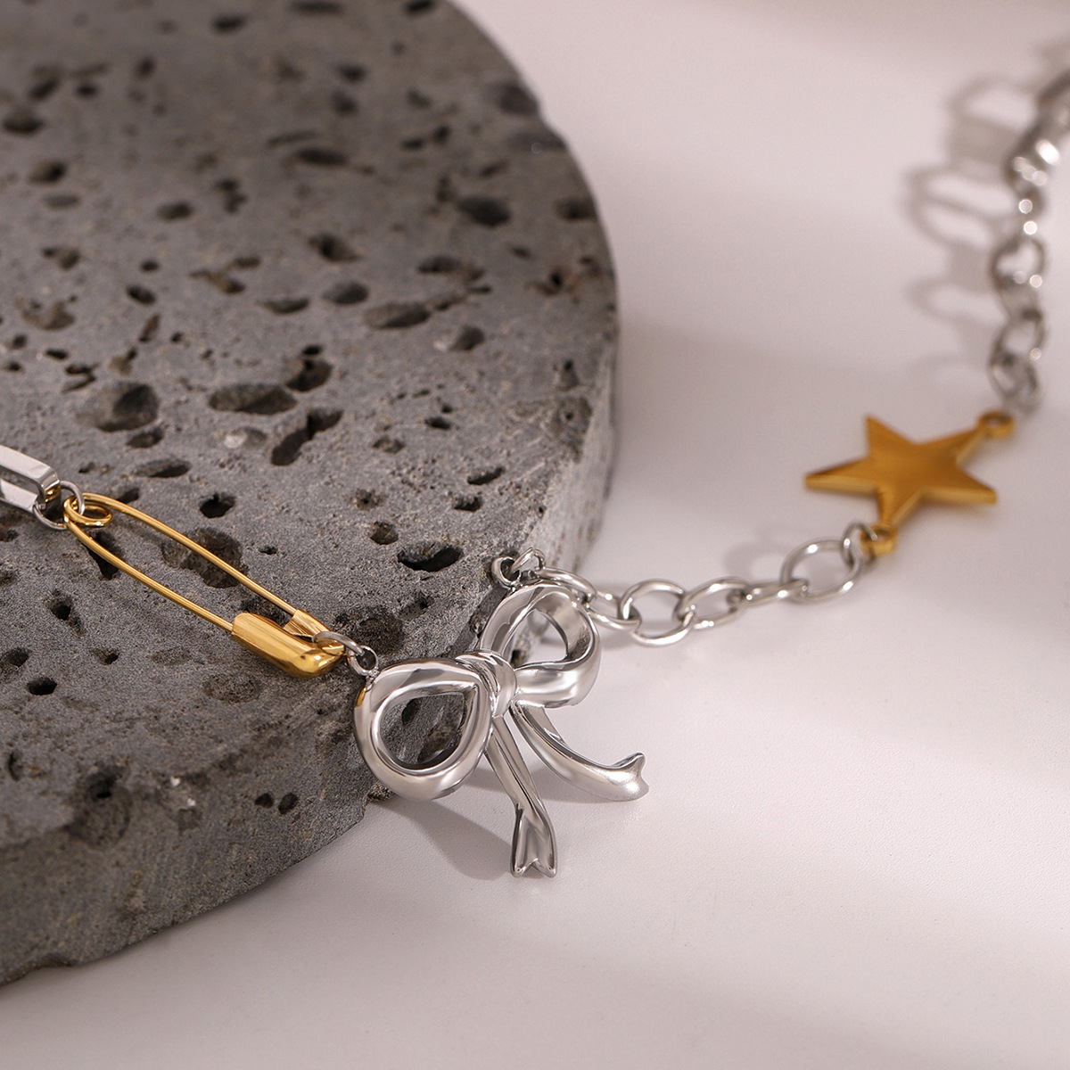 Two-Tone Bow Star Necklace