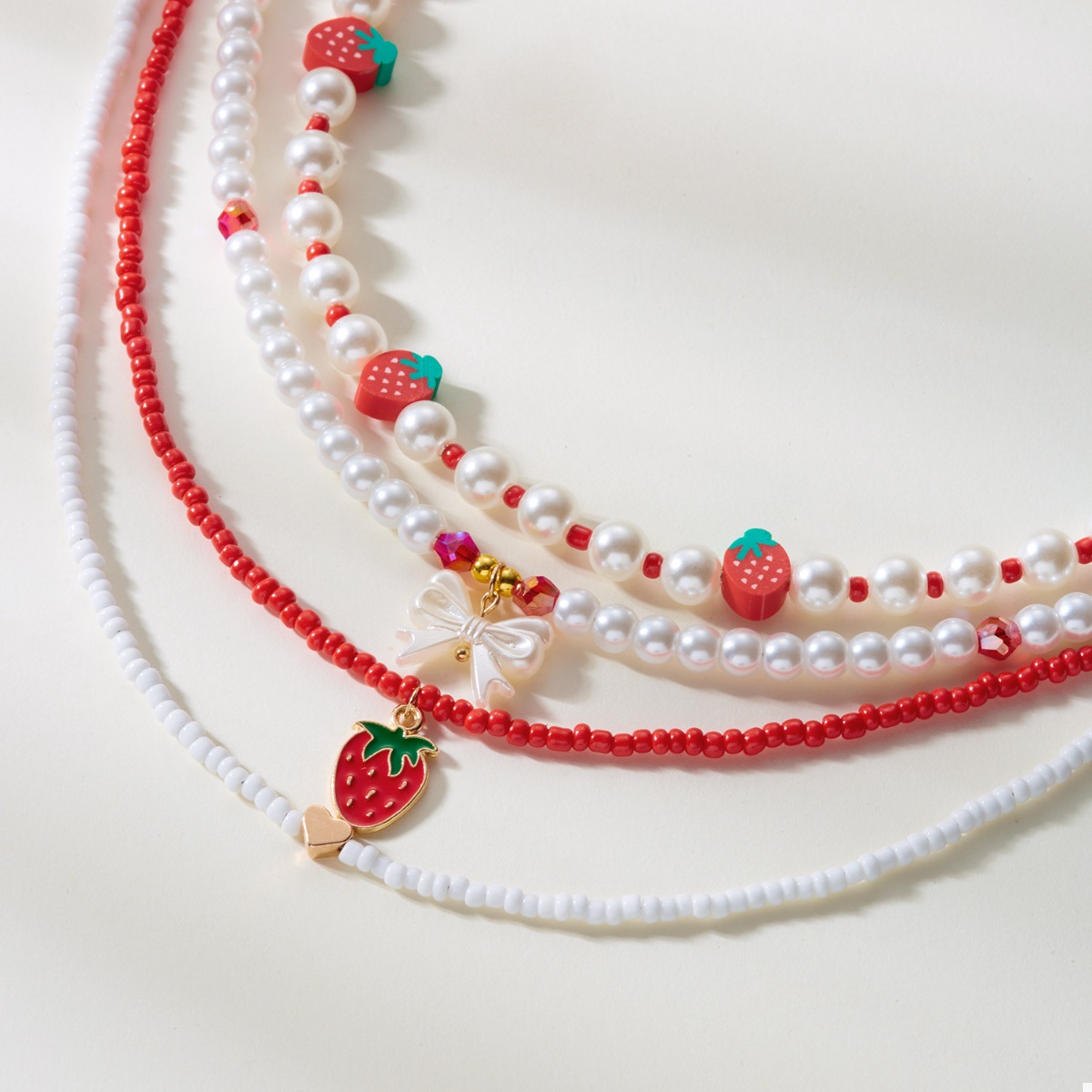 4 Piece Strawberry Pearl Beaded Necklace