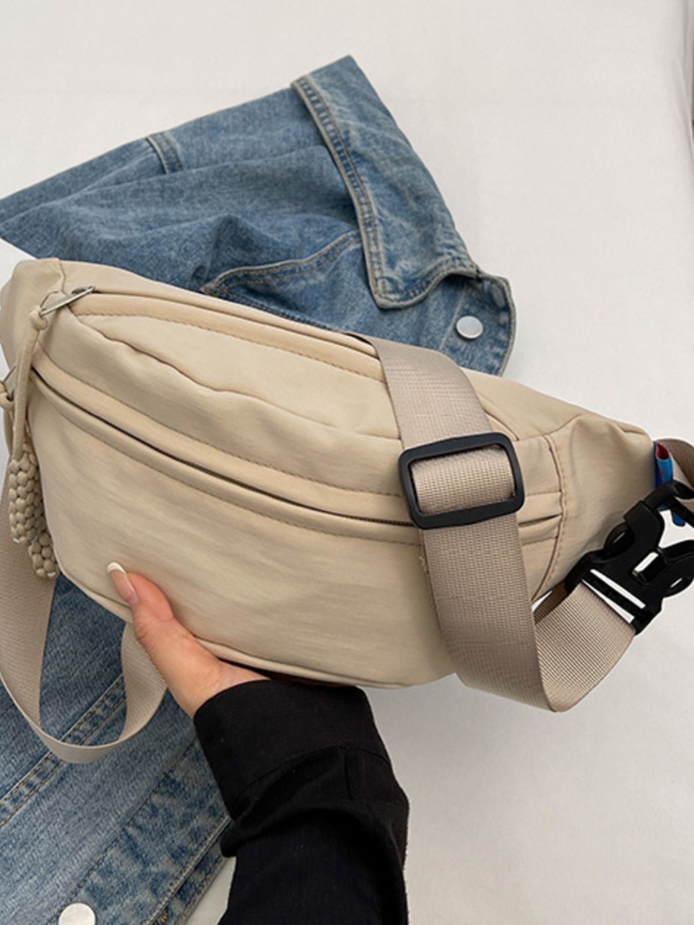 Lightweight Crossbody Bag with Tassel Detail