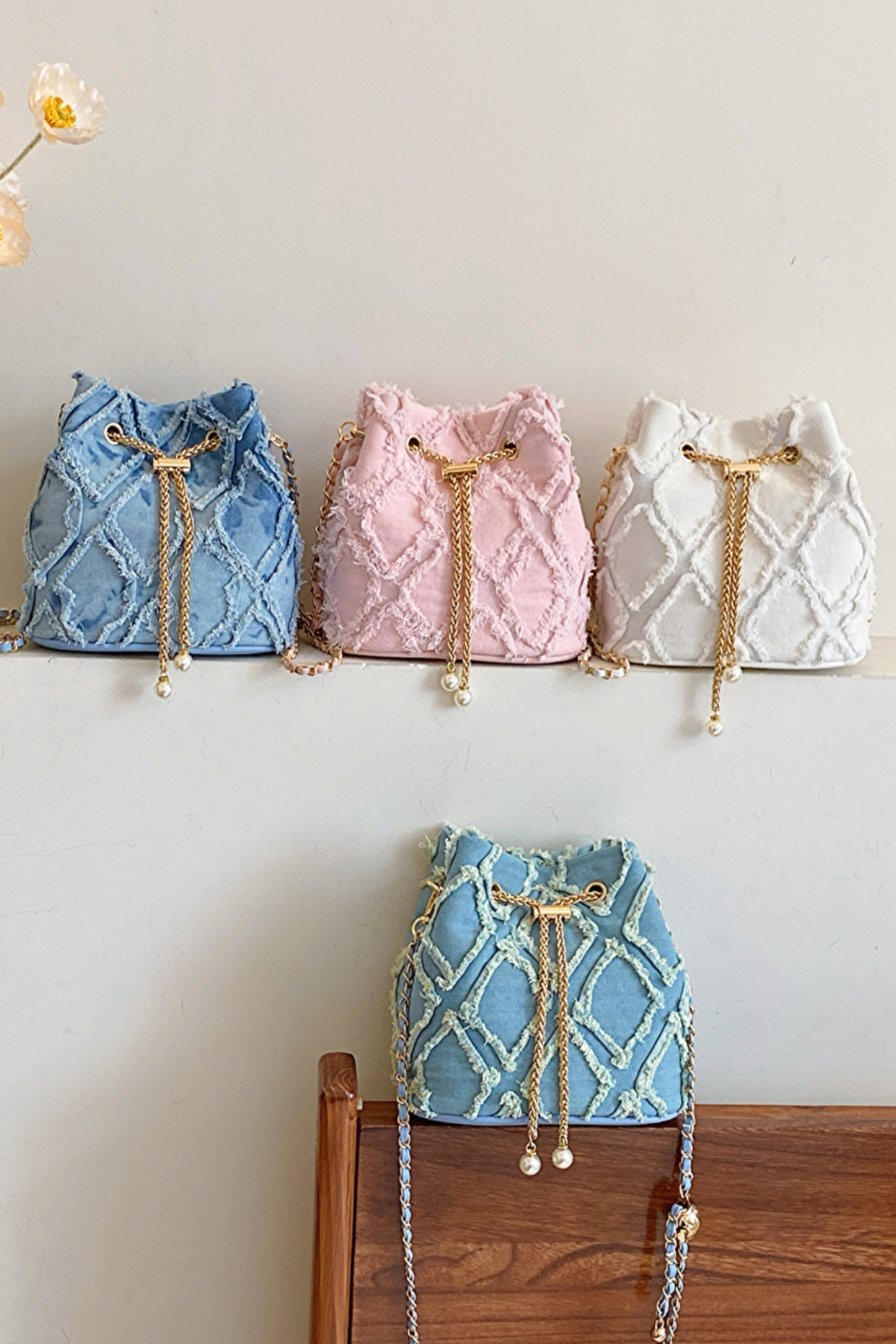Chain Drawstring Raw Edge Denim Bucket Bag 1