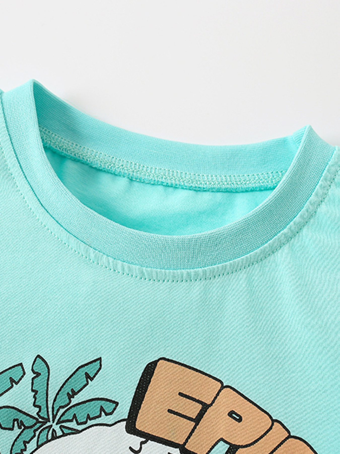 Children's Dinosaur Surfing Adventure Graphic T-Shirt and Shorts Set