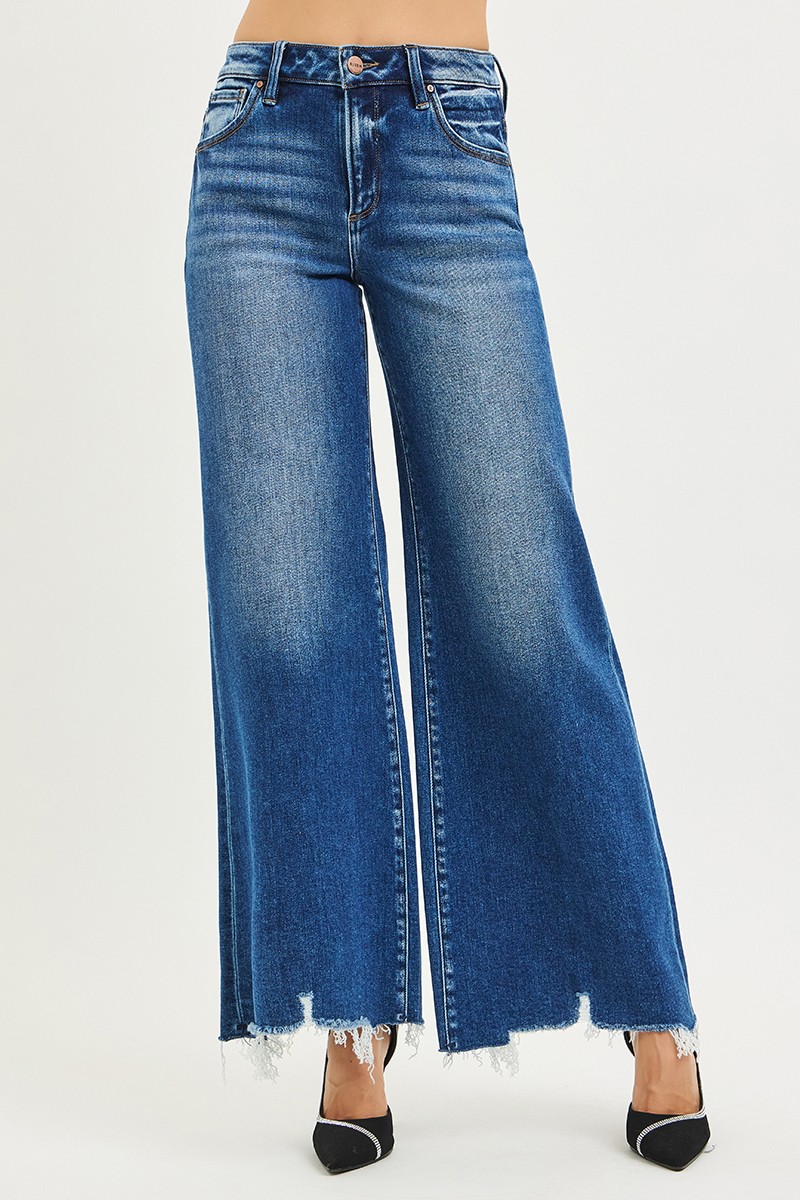 Risen High Rise Wide Leg Jeans With Distressed Hem